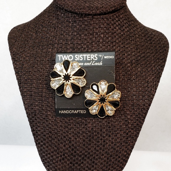 two sisters Jewelry - Vintage Two Sisters Clip Earrings Black and Gold
